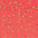 Dark coral ombre fabric with dark red and gold metallic hearts scattered all over