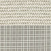 A split pattern fabric, the left features leaves on a light background; the right shows a grey plaid design.