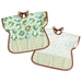 Two of the Toddler Bibs demonstrating the reversible feature, colored in green, cream, and brown fabrics, isolated on a white fabric.