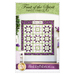 Front cover of the pattern featuring the completed Fruit of the Spirit Panel Star Quilt in cream, purple, and green.