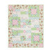 The completed Comfort of Psalms quilt in Serene Garden, a palette of green, blue, pink, and cream floral prints, isolated on a white background.
