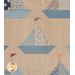 A super close up on one of the sailboats of the quilt, demonstrating fabric and dense top quilting details.