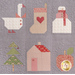 A shot showing a section of the quilt that demonstrates the six Christmas motifs that feature on this quilt, including a goose, a stocking, a snowman, a Christmas tree, a house, and an apple.