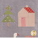 A super close up on a block with a Christmas tree and house, demonstrating piecing, top stitching, and embellishment details. 