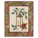 Page from book showing December's quilt, a candle in a lantern surrounded by holly and a poinsettia flower