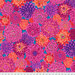 Bright pink fabric with large purple, orange, pink, and crimson dahlias throughout on a cyan background