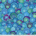 Blue fabric with scalloped spiraled shells made of bright blue, mint green, and purple swirls