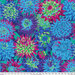 Large, multi colored fabric with large, packed, bright blue, green, and purple dahlia florals throughout