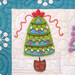A super close up on one of the heavily detailed and embellished wool Christmas tree blocks.