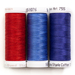 Three spools of thread in red, cornflower blue, and royal blue, isolated on a white background.