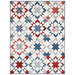 The completed Starly quilt in muted shades of red, white, light blue, and denim blue, isolated on a white background.