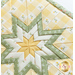 A super close up on the folded star center of the hot pad, demonstrating fabric, piecing, and top stitching details.