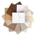 The fat quarters included in the set, fanned out in an appealing circle, isolated on a white background.
