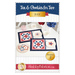 Front cover of pattern showing the completed July placemats, stated with patriotic star shaped cookies, white tea cups, a pink sugar caddy, and red and blue flowers.