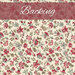 Cream fabric with tossed vintage florals in red, teal, pink, and green. A berry red banner at the top reads 