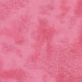 A basic pink fabric with crosshatching and mottling.