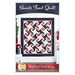 Front cover of the pattern showing the completed Snails Trails quilt in the Friday Harbor collection.