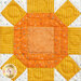 A super close up on one of the sunflower blocks, demonstrating fabric and top quilting details.