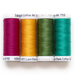 Four spools of thread in teal, green, gold, and magenta isolated on a white background.