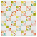 The completed Butterfly Patch quilt, colored in the Kindred collection from Moda Fabrics, isolated on a white background.