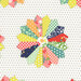 A close up swatch of the fabric showing detail and scale of each pinwheel.