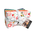A bundle of bright floral fabrics included in the Raspberry Summer Fat Eighth Set wrapped in a white Moda Fabrics ruler ribbon isolated against a white background.