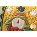 A super close up on the center applique scarecrow of the pillow, demonstrating fabric and stitching details.