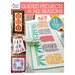 The front of the Quilted Projects For All Seasons book showing four of the 11 finished projects featured in the book, including table runners, wall hangings, and quilts.