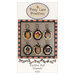 The front of the Festive Fall Ornaments pattern featuring the finished ornaments on a gray background..