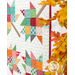 A partial shot of the banner taken at a slight angle; decorative autumn leaves peek into frame from the right side.