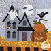 A close up on the center block, featuring a scene of haunted house with a ghost popping out of the top window while bats fly in front of the moon. A large stack of pumpkins sit next to the house with a crow perched on a stem.