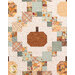 A shot of one of the pumpkin and patchwork blocks, demonstrating piecing, fabric, and top quilting details. 