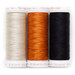 Three spools of thread: cream, orange, and black, displayed side by side against a white background.