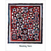 A contrast heavy quilt with a variety of red, white, and blue stars and the words Shooting Stars below it