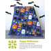 Front of the Happy Halloween Quilt, colored in bright purple, orange, black, and white fabrics.