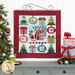 The completed Mistletoe Crossing wall hanging, featuring ornament, tree, and present blocks bordered in solid red fabric, hung on a white paneled wall and staged with coordinating gifts and Christmas decor.