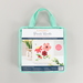 The front of the Punch Needle Kit in its packaging, a bright aqua tote, isolated on a white background.