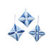 The three completed Cathedral Window Ornaments colored in blue and white fabrics from the Holiday Flourish Festive Finery collection, isolated on a white background.