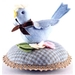 Image of the Bitty Bird Pincushion finished project in a baby blue color way.