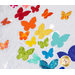 Colorful fabric butterfly shapes on a white background