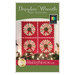 The front of the Dresden Wreath Wall Hanging pattern by Shabby Fabrics showing the finished wall hanging.