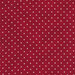 Fabric features tiny cream polka dots on mottled crimson red | Shabby Fabrics