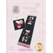 The front cover of Hare's Tale Of Love Pattern showing the finished table runner with two bunnies and a patchwork heart.
