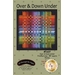 Over & Down Under Front Cover featuring a brightly colored pieced quilt with a basket weave effect