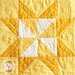 The third yellow and white block in the Learn to Quilt Beginner Quilt