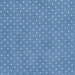 Fabric features tiny cream polka dots on mottled denim blue | Shabby Fabrics