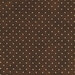 mottled dark brown fabric with tiny cream polka dots