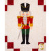 A nutcracker on a cream quilted background