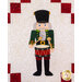 A drummer nutcracker on a cream quilted background