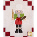 A chef nutcracker on a cream quilted background